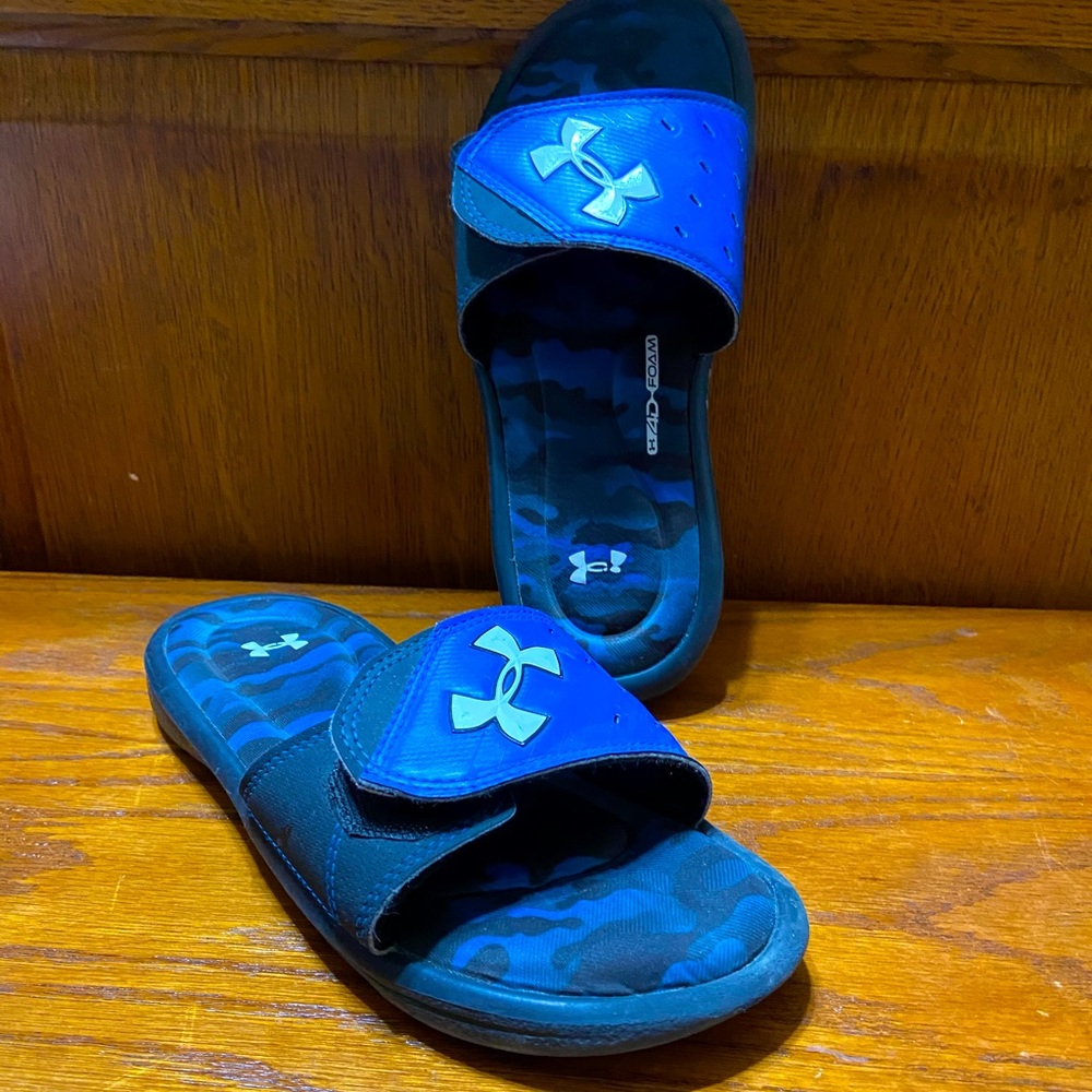 Blue Under Armour slides, size 5Y.
